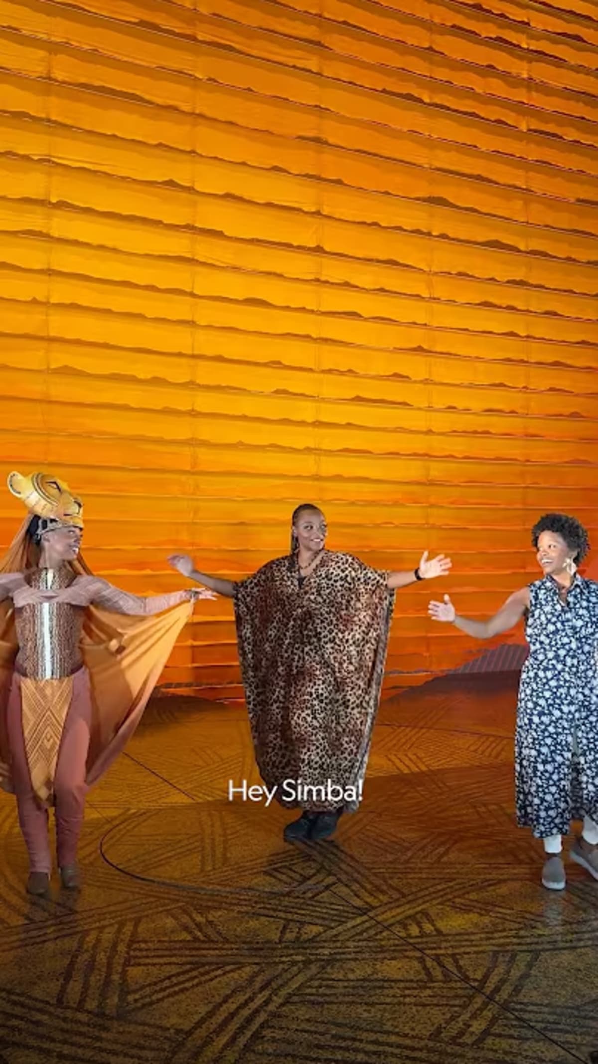 ** Broadway performers in The Lion King costumes backstage at the theater