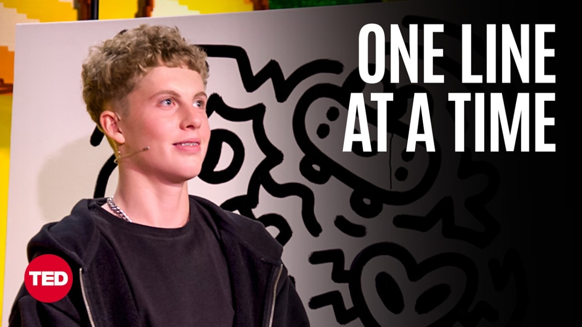 ** Artist Joe Whale speaking at TED conference while creating a live doodling demonstration on stage
