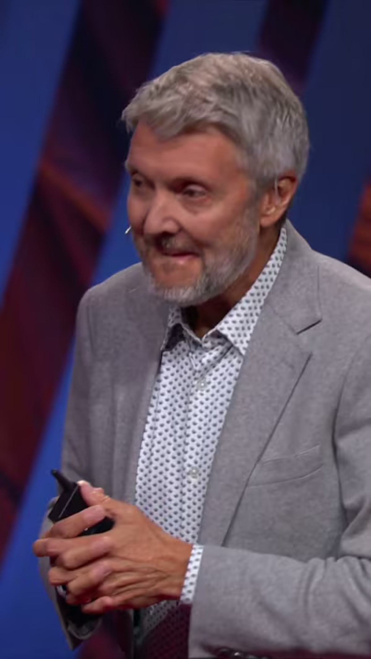 Gary Barker speaking on TED stage about masculinity and empathy in boys