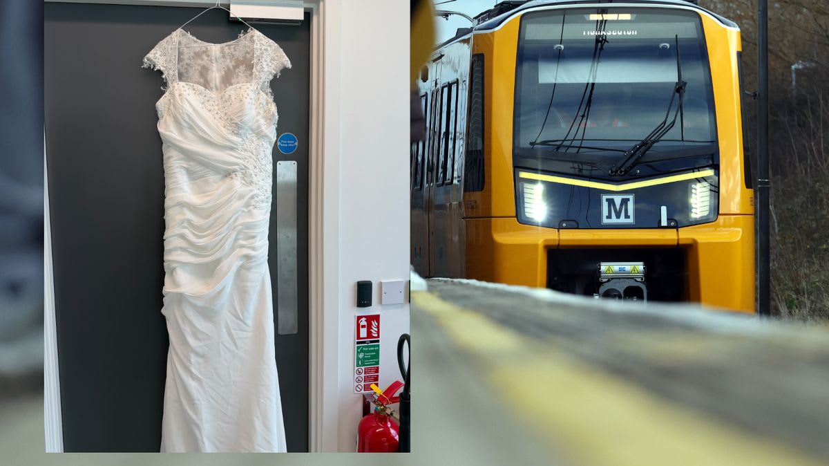 White wedding dress hanging safely in Metro transit authority's lost property office