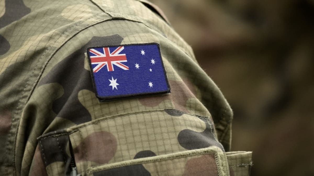 Australian flag with futuristic holographic displays showing artificial intelligence and quantum computing technology symbols