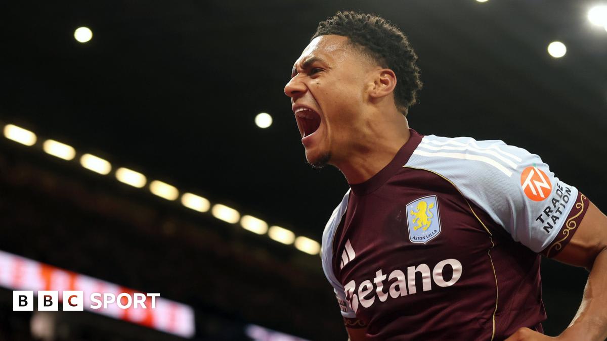 Ollie Watkins celebrating in Aston Villa jersey after scoring against Liverpool at home