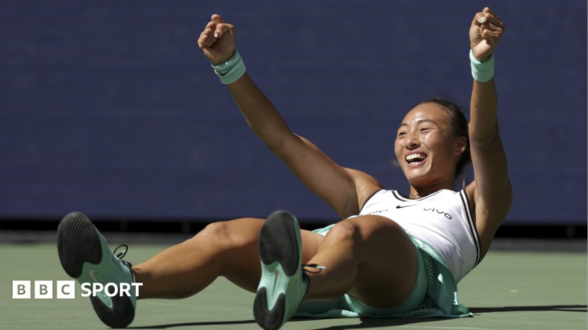 Zheng Qinwen celebrating on court at Arthur Ashe Stadium during US Open quarterfinal victory