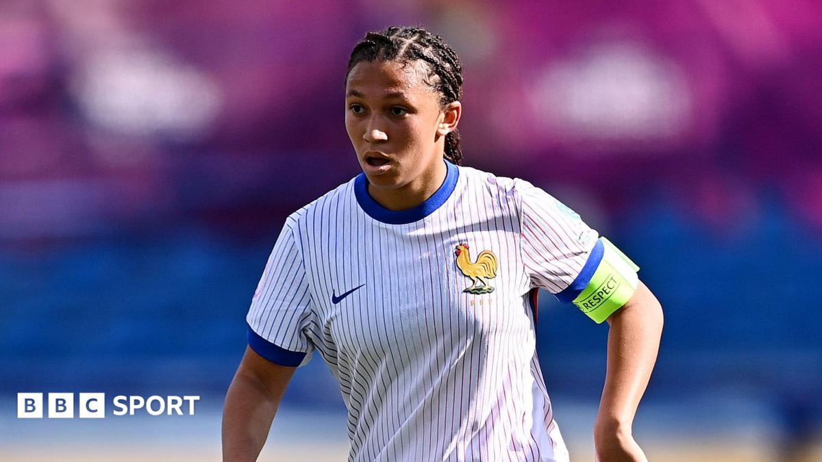 French Under-19 women's football captain Maeline Mendy leading her team during championship match