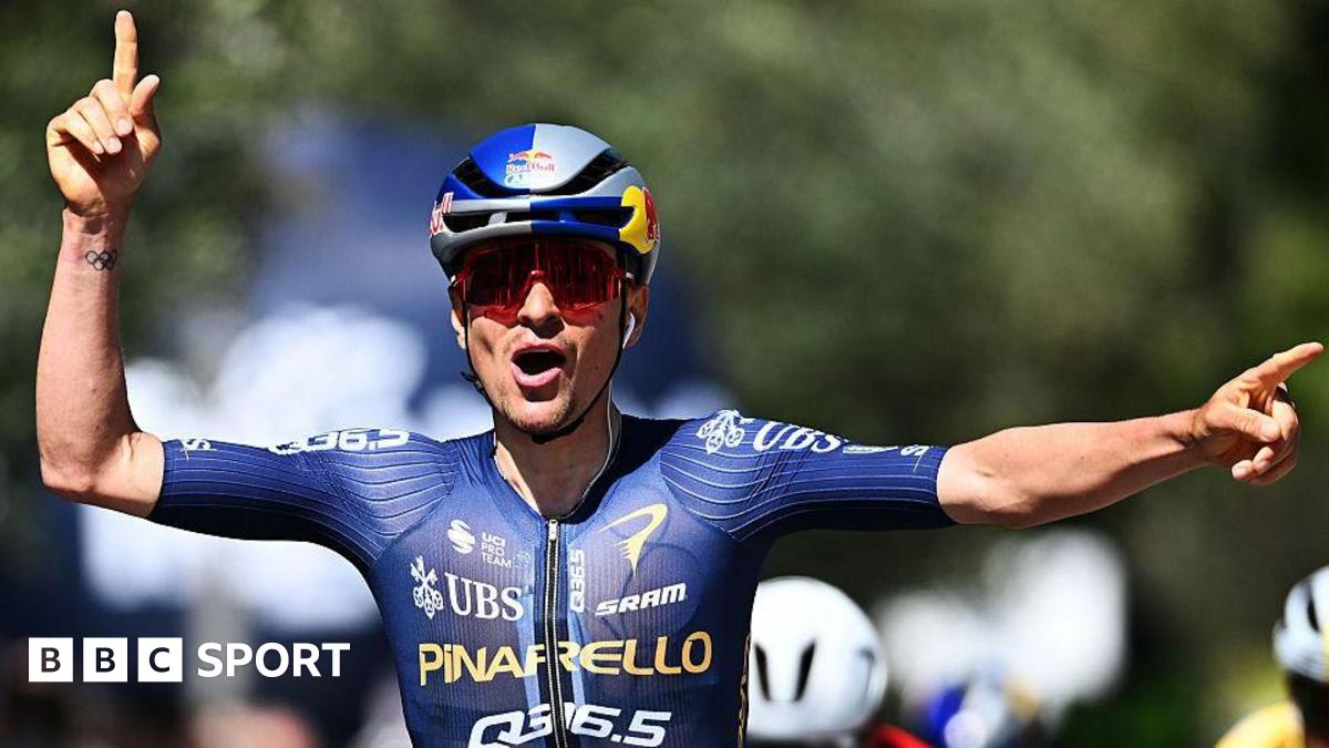 British cyclist Tom Pidcock celebrating victory at Tour of the Alps finish line in Italy