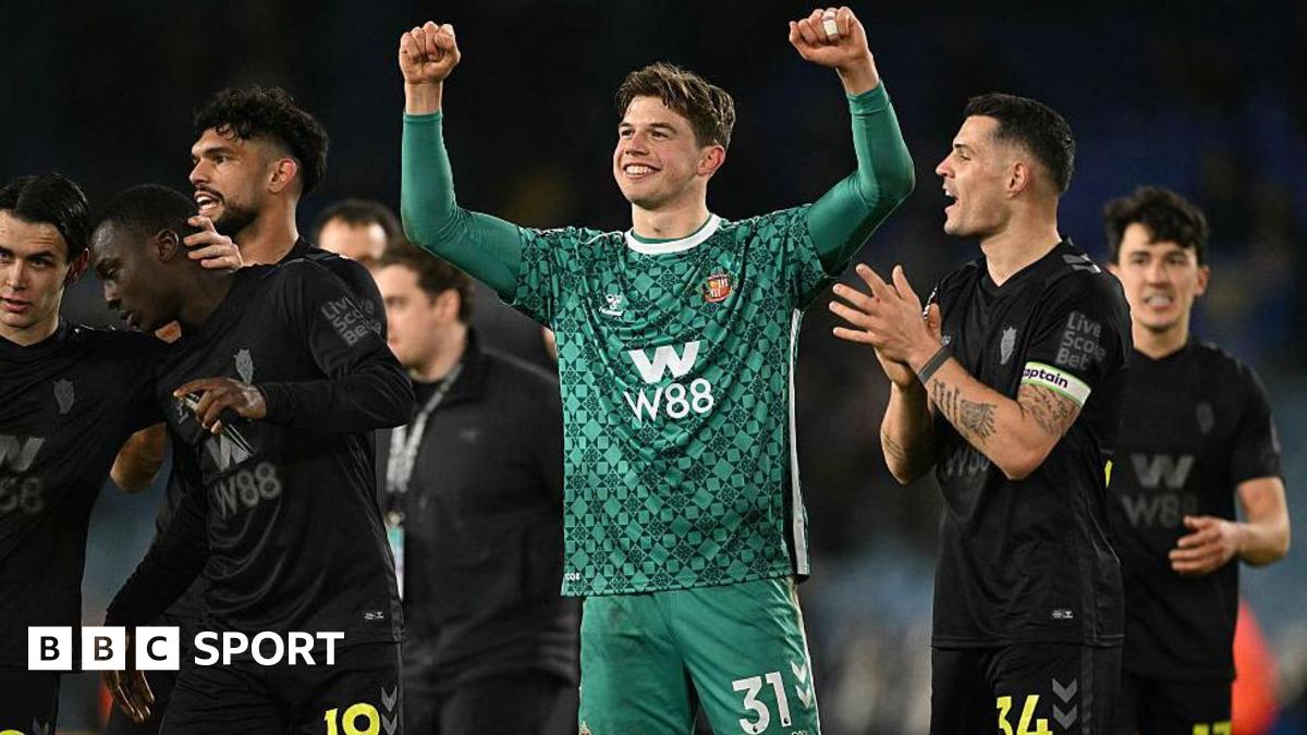 Sunderland players celebrating victory on the pitch at Leeds United's Elland Road stadium