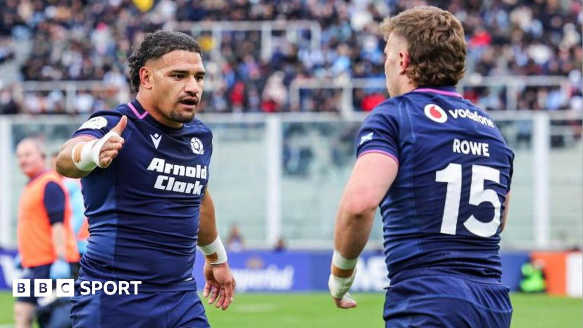 Scotland rugby players celebrating on field after scoring try against Argentina in Cordoba