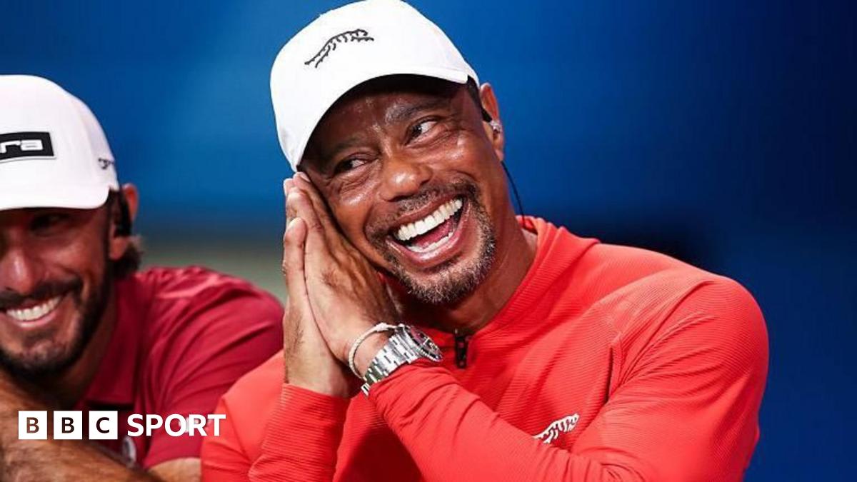 Tiger Woods preparing to play golf, showing determination after multiple surgeries and year-long recovery