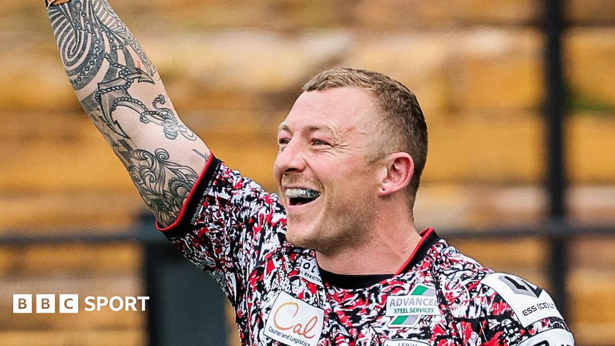 Josh Charnley in Leigh Leopards jersey celebrating try during rugby league match