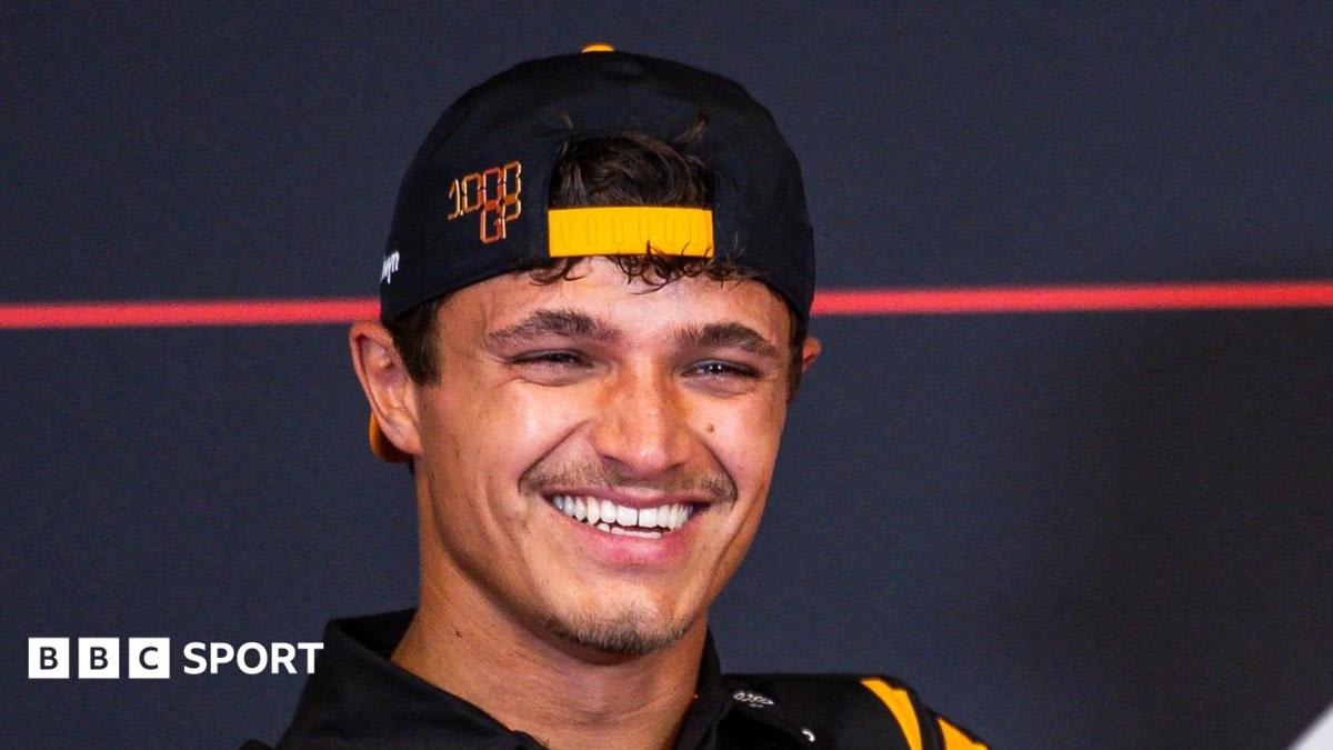 Lando Norris celebrating victory at junior racing level before reaching Formula 1