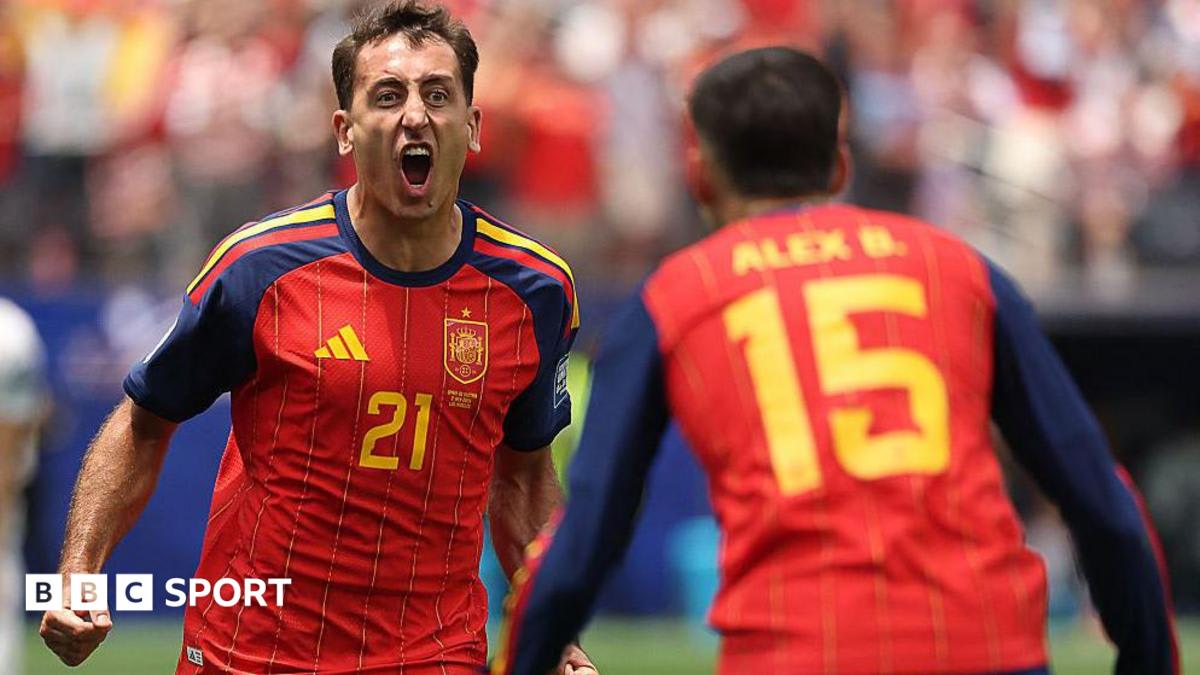 Mikel Oyarzabal in red Spain jersey celebrating goal during World Cup match against Austria