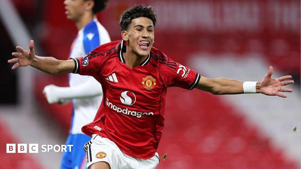 Young footballer JJ Gabriel training with Manchester United's senior squad on the pitch