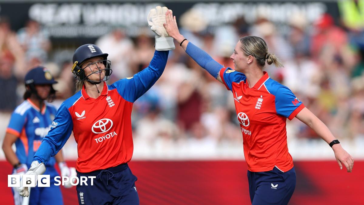 Freya Kemp celebrates after hitting a boundary for England against India in Bristol