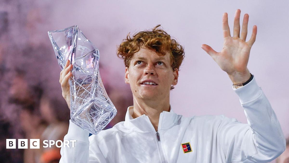 Jannik Sinner celebrating with trophy after winning Miami Open tennis tournament