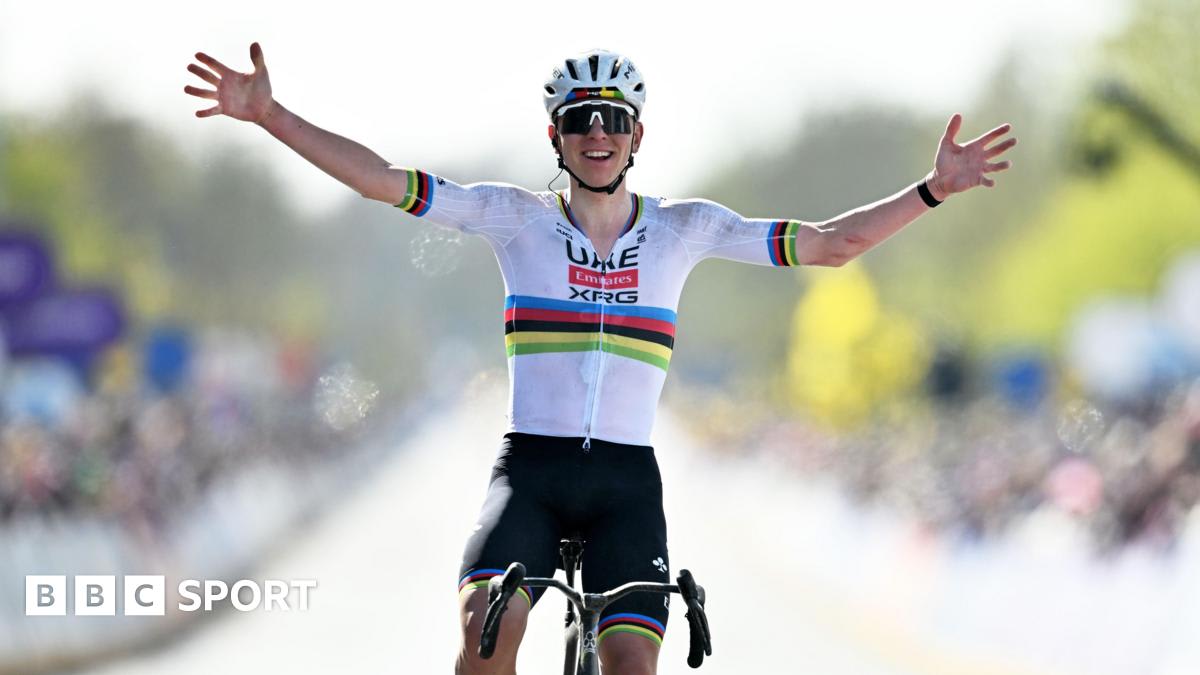 Tadej Pogacar celebrating victory at Tour of Flanders finish line in Belgium