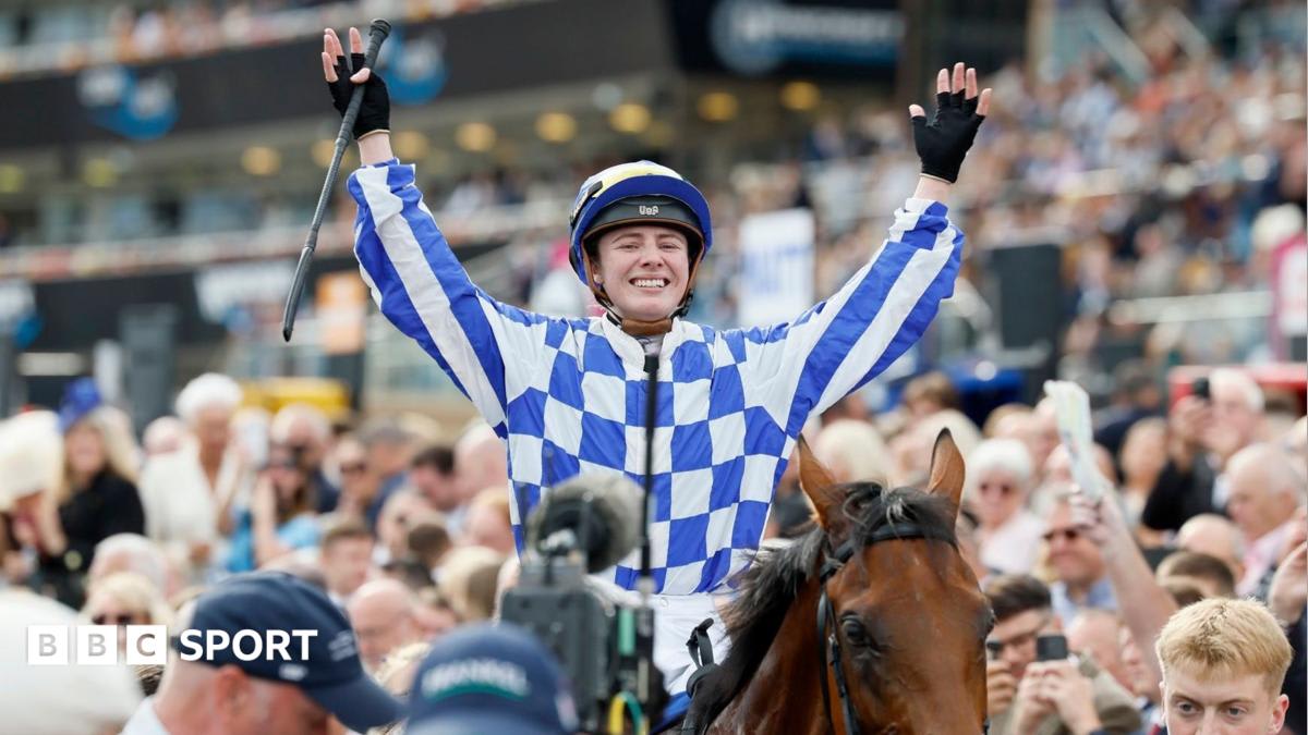 Saffie Osborne on Highwayman celebrating their historic St Leger victory at Doncaster racecourse