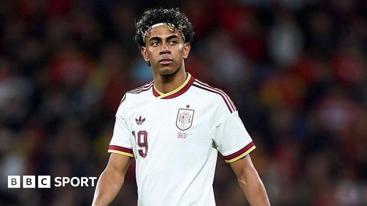 Young soccer player Lamine Yamal in Spain national team jersey during match