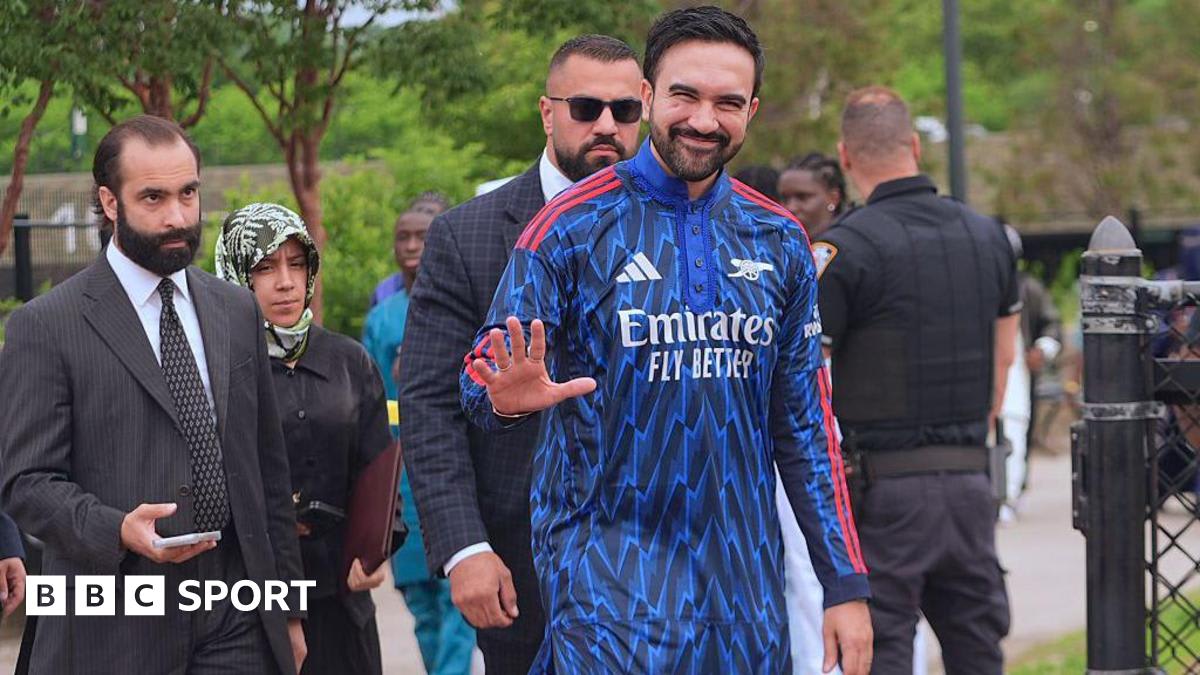 New York Mayor Zohran Mamdani wearing navy and red Arsenal-themed kurta at religious gathering