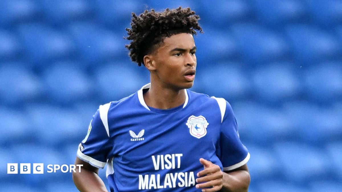 Young footballer Noah Anyadike in Cardiff City kit during his record-breaking debut match