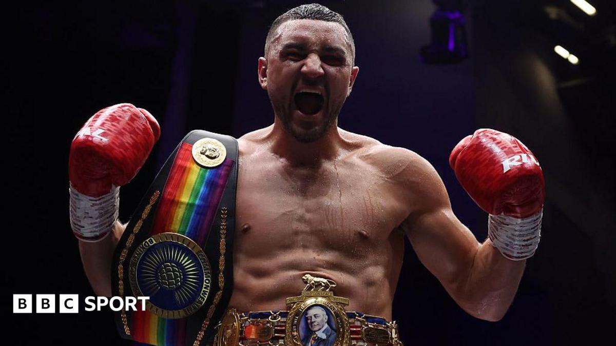 Boxer Callum Simpson celebrating victory in the ring after winning his rematch