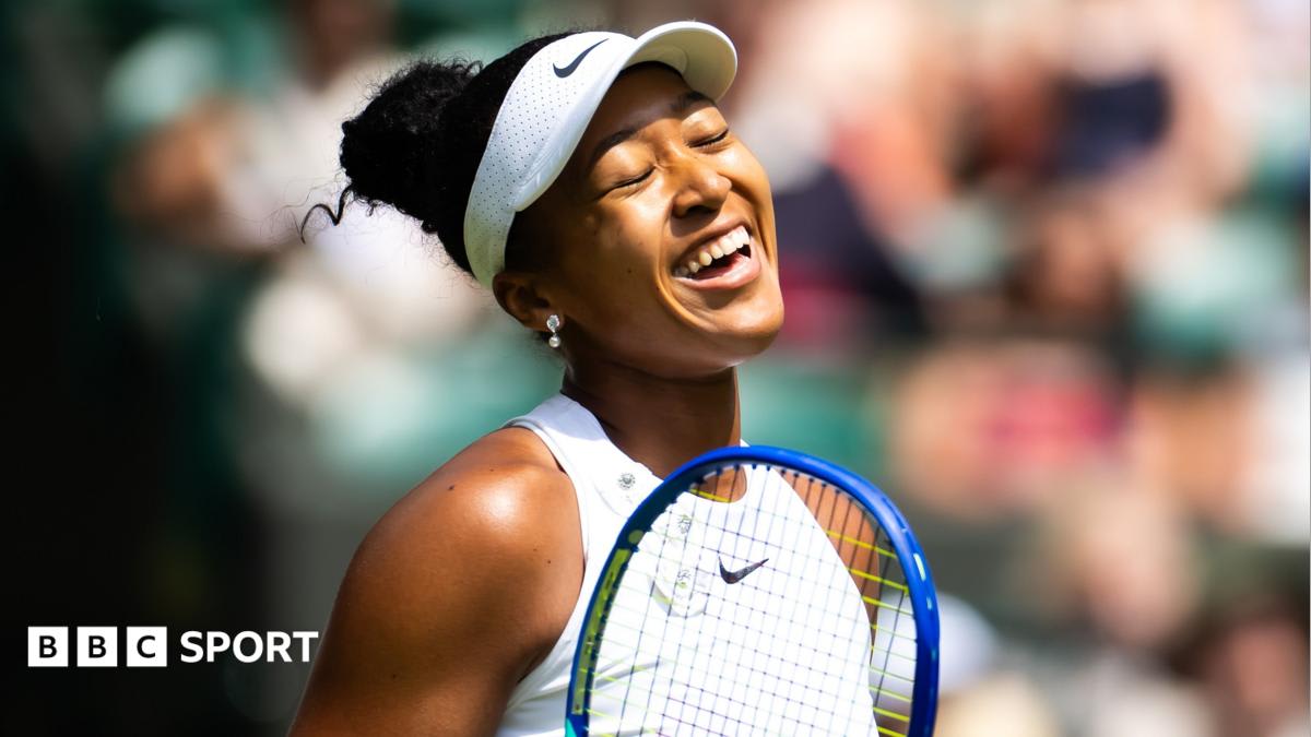 Naomi Osaka celebrating on Wimbledon Centre Court after defeating the world number one