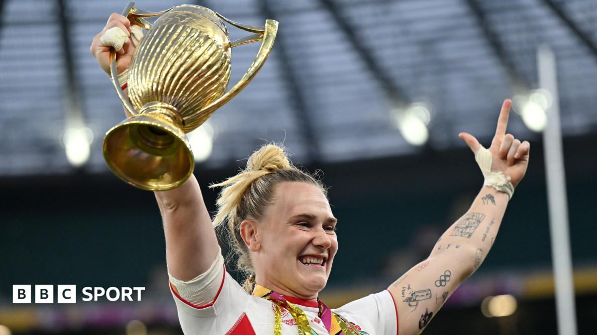 England's Red Roses women's rugby team celebrating their World Cup victory before massive crowd