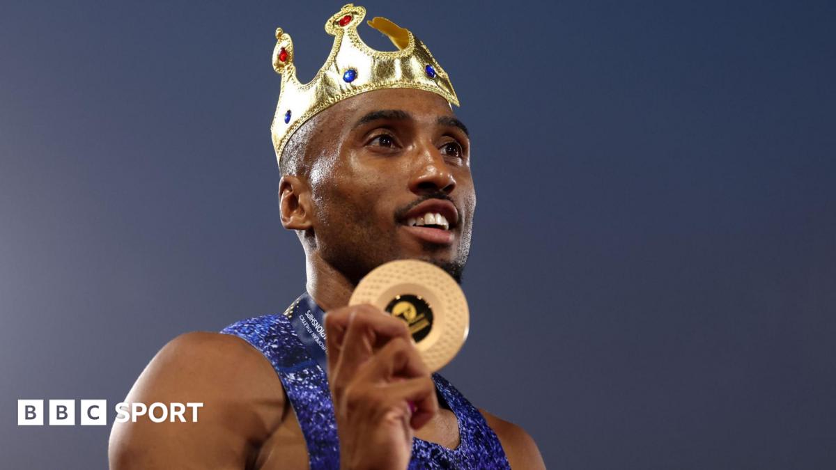 Matthew Hudson-Smith celebrates winning 400m gold medal at Birmingham's Alexander Stadium in Great Britain