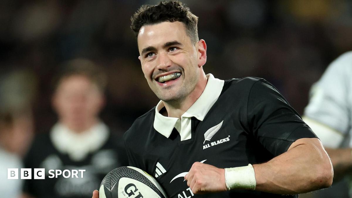 Will Jordan in New Zealand All Blacks uniform celebrating try at Wellington Regional Stadium