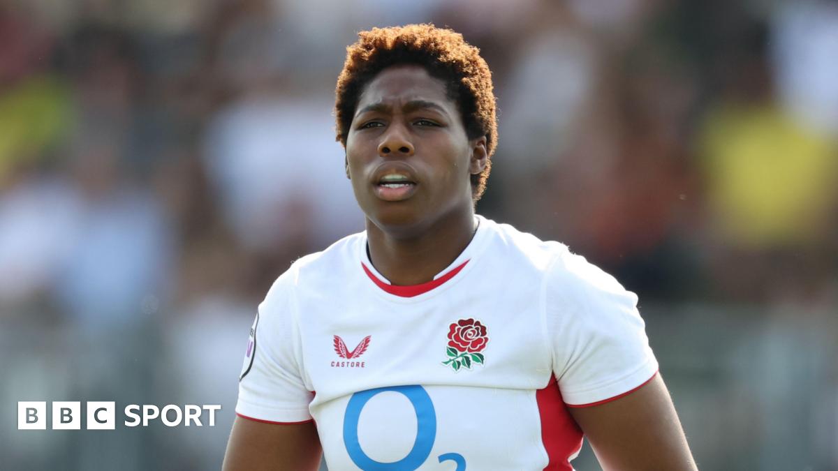 Rugby player Christiana Balogun in England Red Roses jersey running on field during Six Nations match