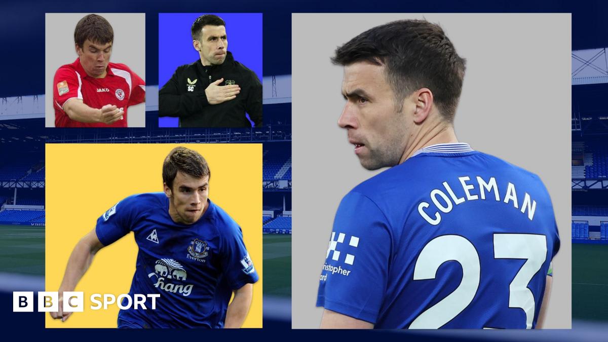 Seamus Coleman in Everton jersey celebrating with fans at Goodison Park stadium