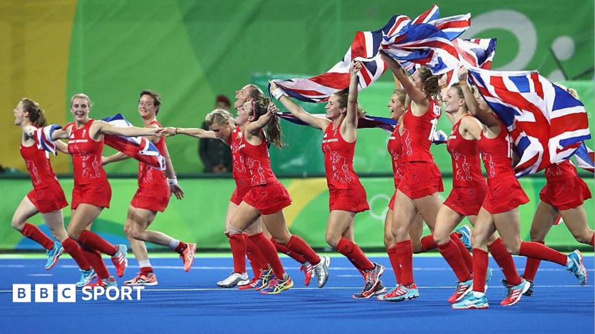 ** Great Britain women's hockey team celebrating with gold medals at Rio 2016 Olympics