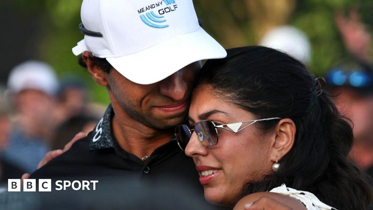 Aaron Rai embracing his wife Gaurika after winning the US PGA Championship on the 18th green