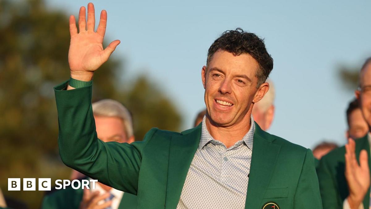 Rory McIlroy celebrates in his green Masters jacket after winning second consecutive championship at Augusta