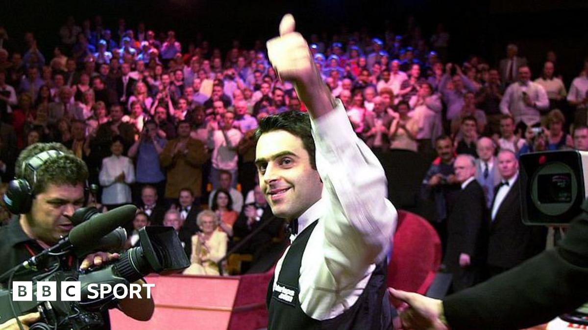 ** Players shaking hands at Sheffield's Crucible Theatre before snooker World Championship match begins