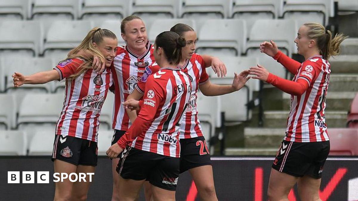 Sunderland Women's football team players celebrating during a match at their home stadium