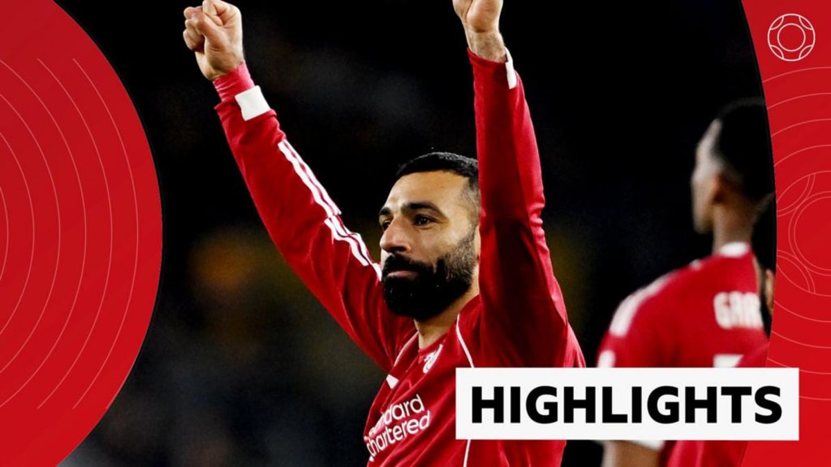 Liverpool players celebrating their FA Cup victory over Wolves at Molineux Stadium