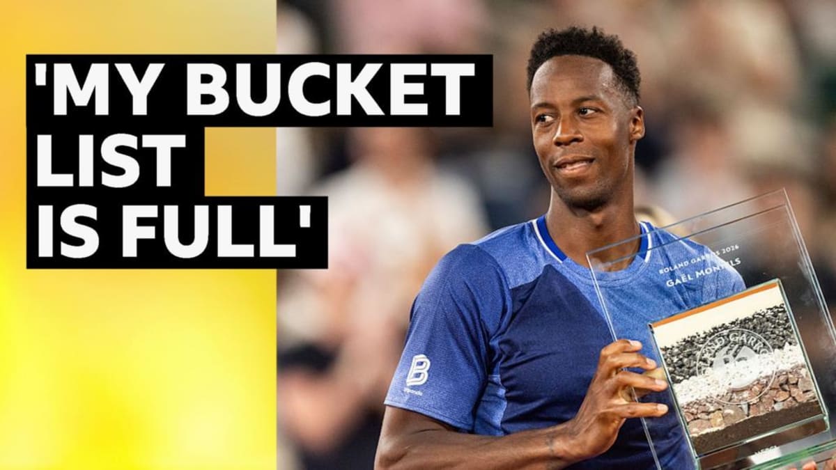 Gael Monfils waves to crowd at French Open tennis tournament in Paris