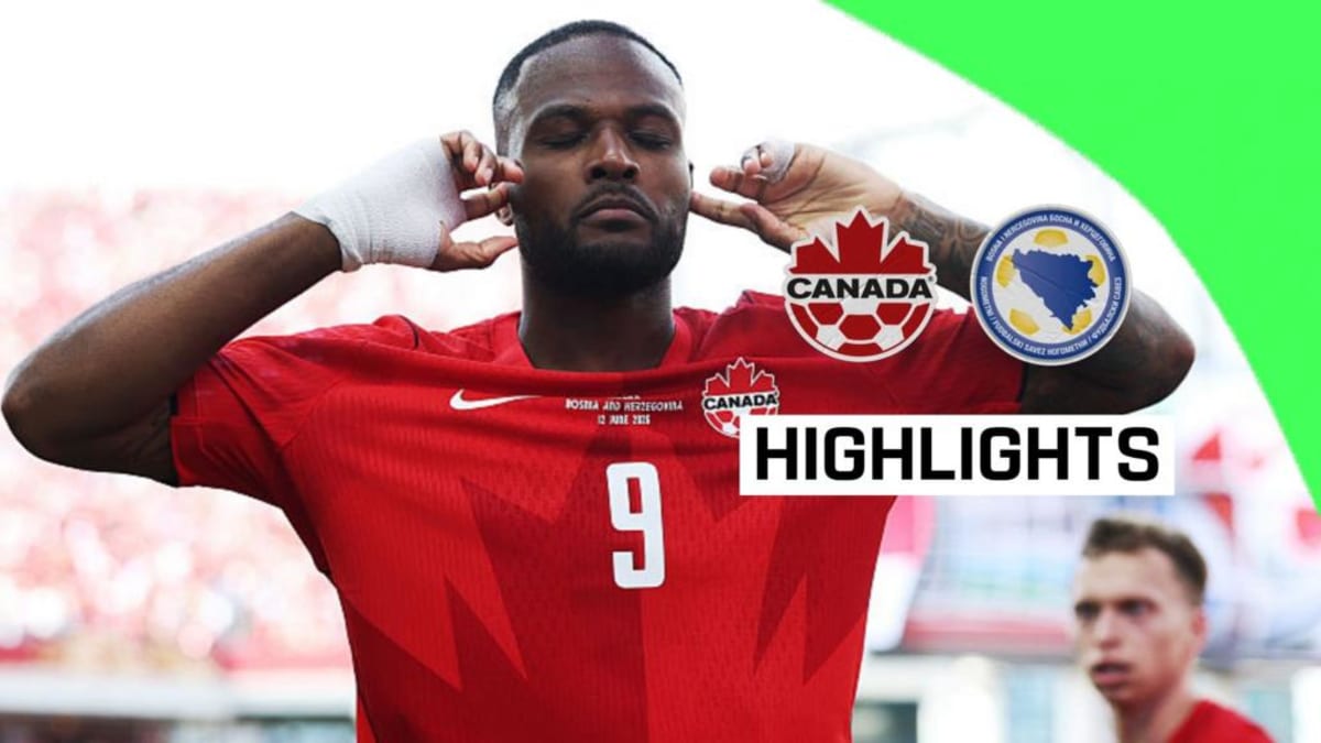 ** Cyle Larin celebrates after scoring Canada's first ever World Cup goal against Bosnia-Herzegovina