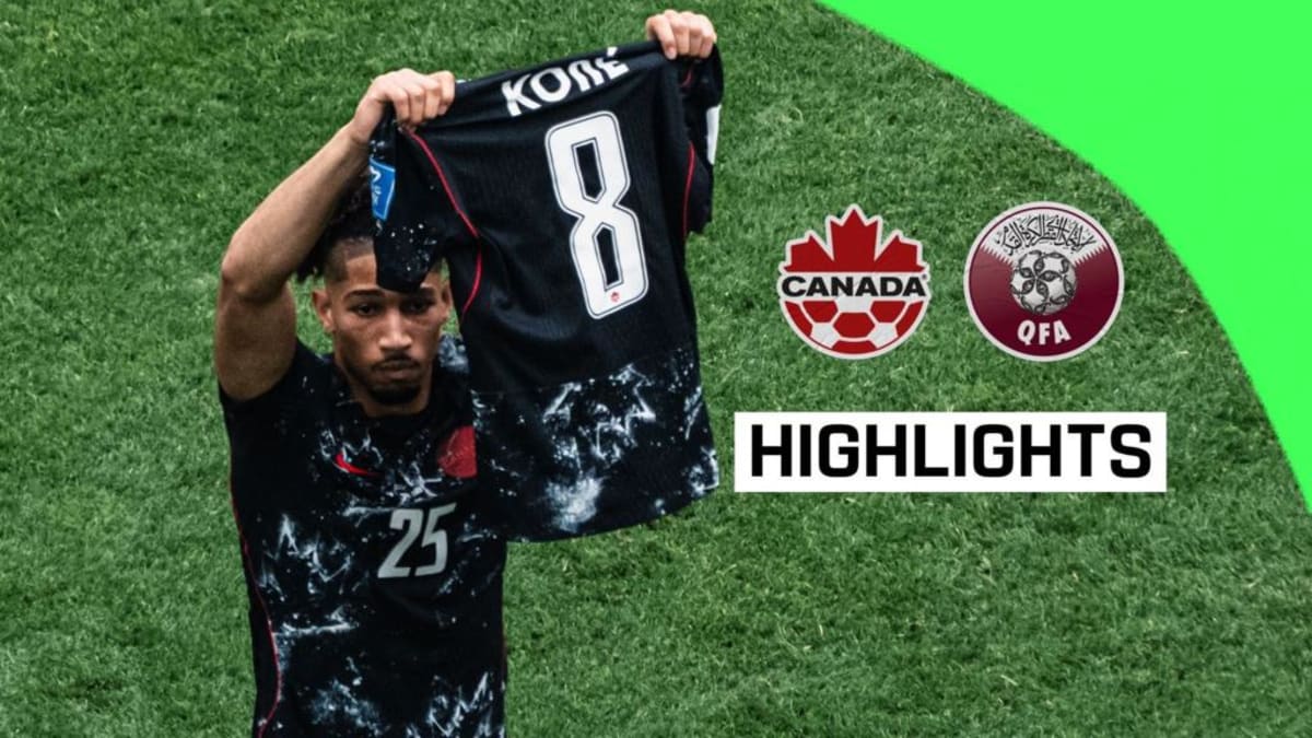 Canadian soccer players celebrating together on field after historic first World Cup victory
