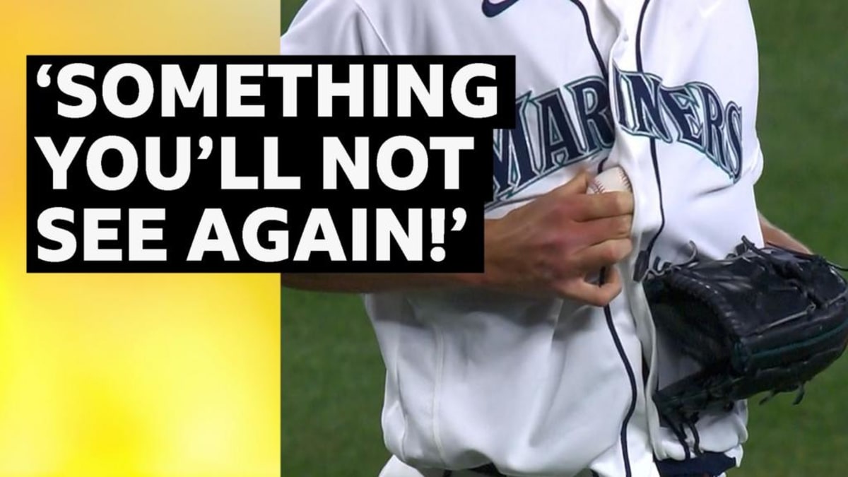 Seattle Mariners pitcher Logan Gilbert on mound after ball enters his jersey