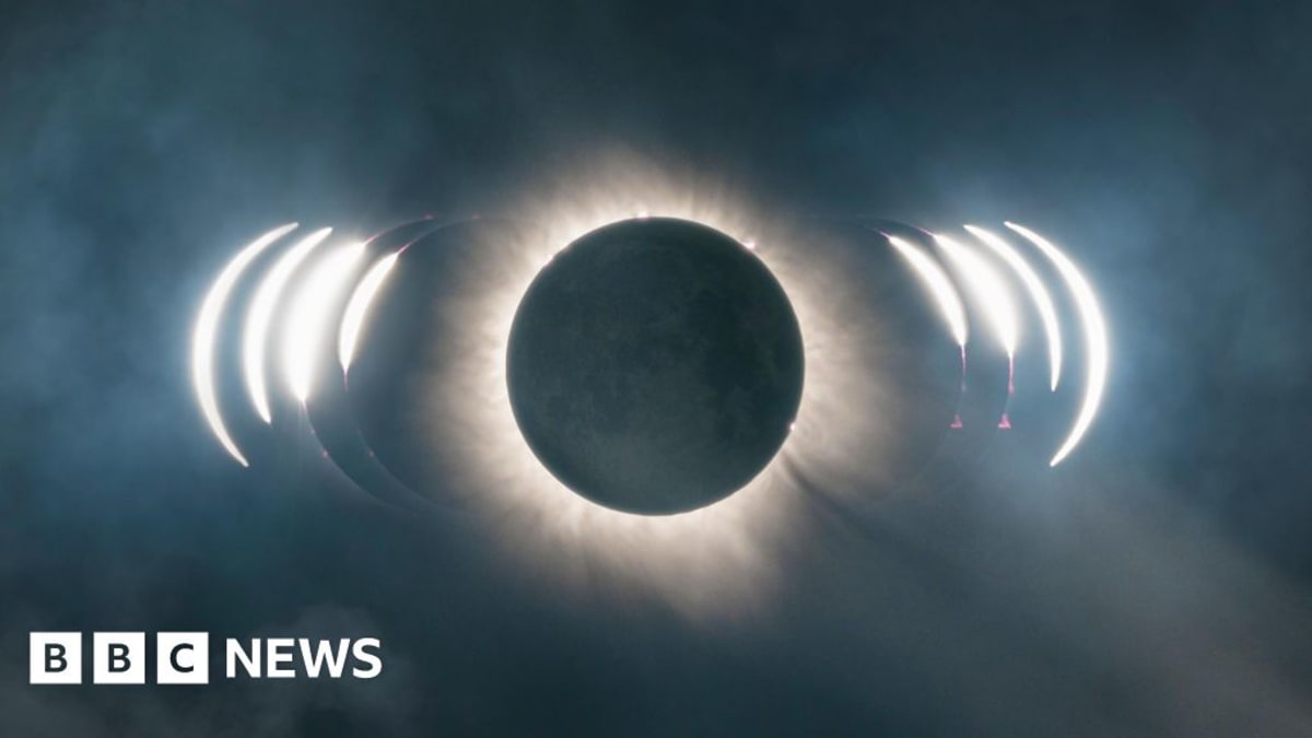 Partial solar eclipse showing moon covering most of the sun over southwestern England horizon