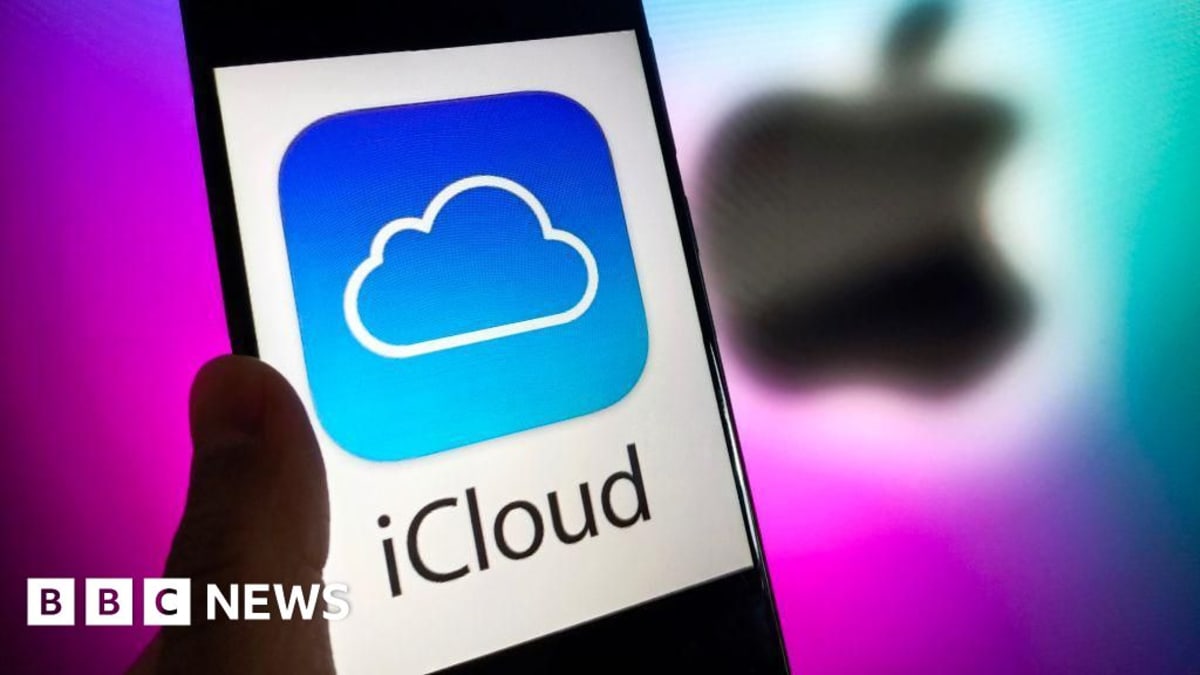 Apple iCloud logo on smartphone screen representing lawsuit for UK users