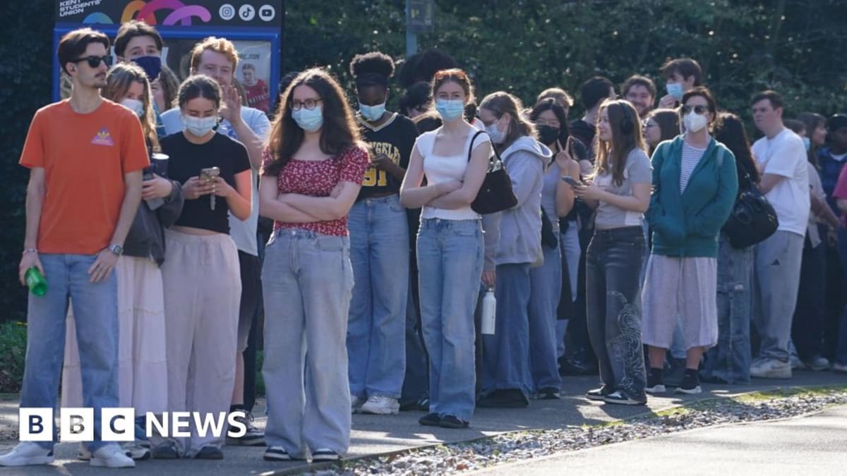 University students queue outside vaccination center in Kent during expanded meningitis protection program