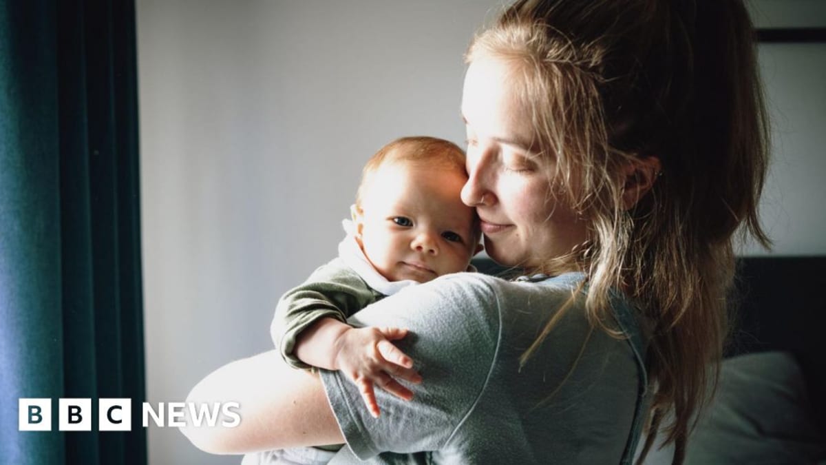 Healthcare provider preparing vaccine for pregnant woman during prenatal appointment