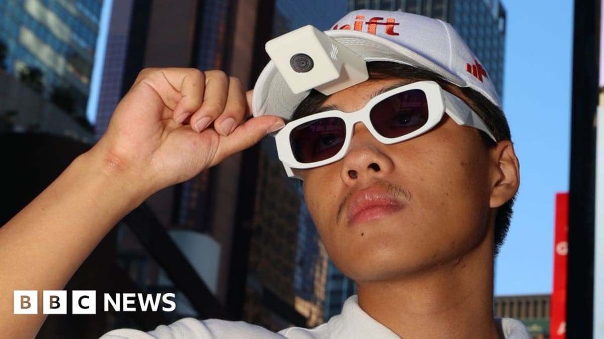 Cleaner wearing cap-mounted camera records hand movements while cleaning New York apartment kitchen