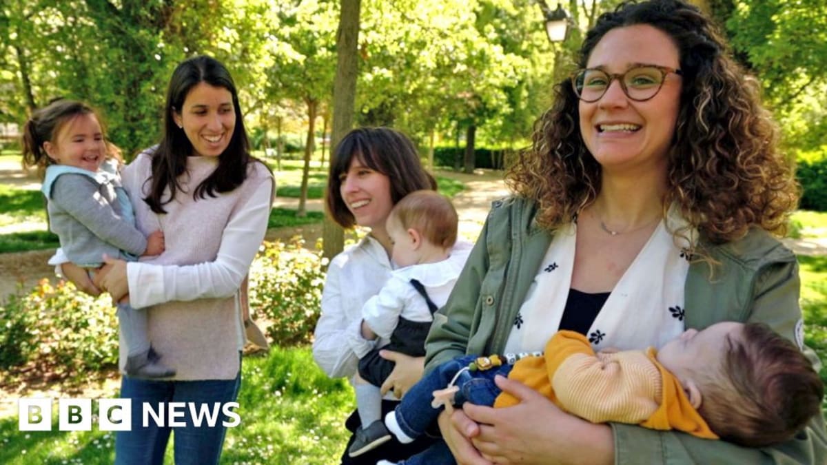 Pregnant woman smiling during brain MRI scan in Spanish research laboratory