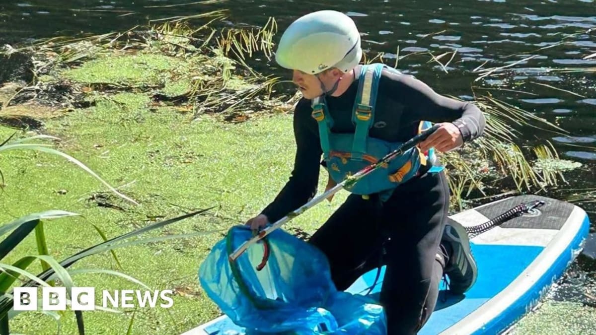 Volunteers gather dozens of filled trash bags along Durham's River Wear during community cleanup event