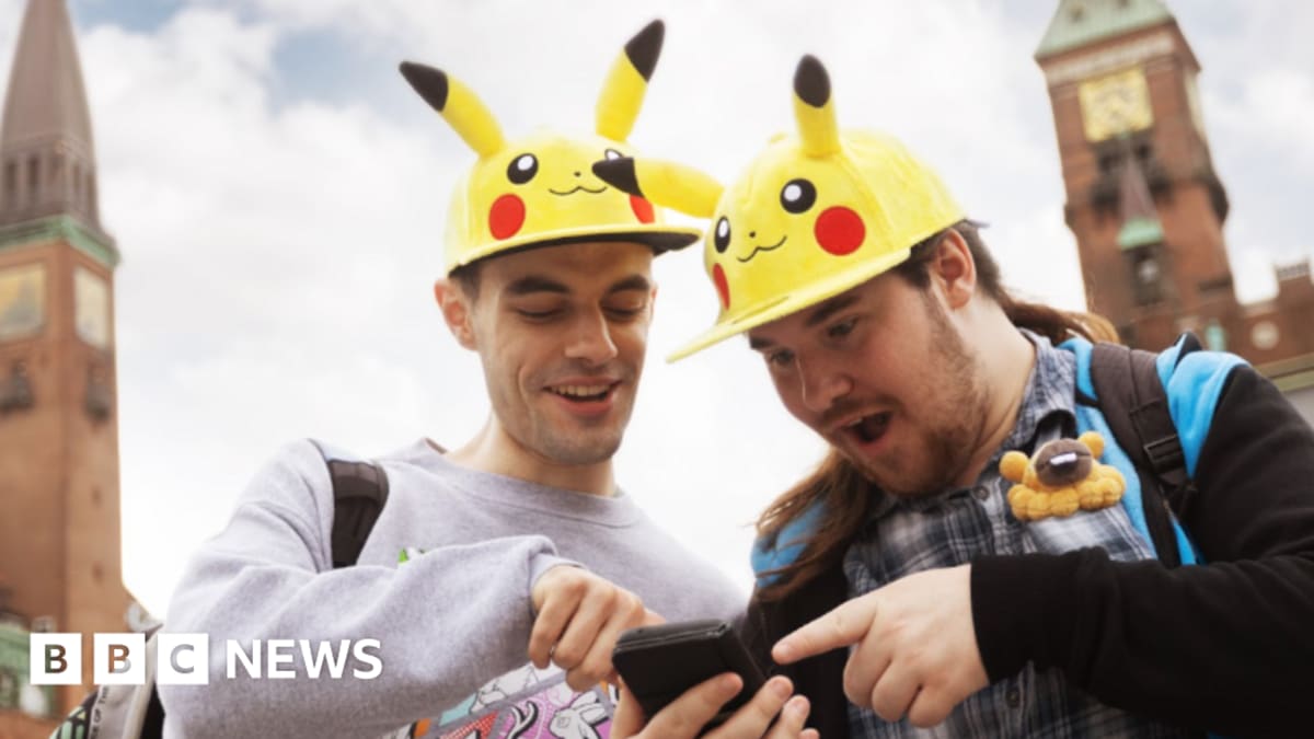 Players gather in Times Square to celebrate Pokémon Go's 10th anniversary event
