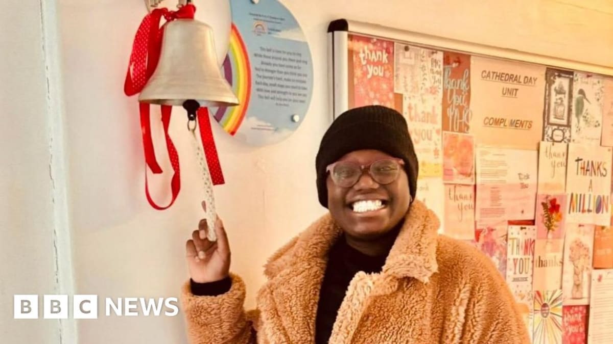 Abigail Chirwa, breast cancer survivor from Dover, smiling confidently after completing treatment