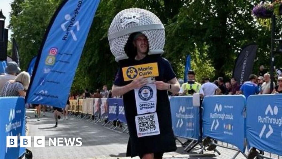 Comedian Runs Half Marathon Dressed as Microphone for 2nd Record